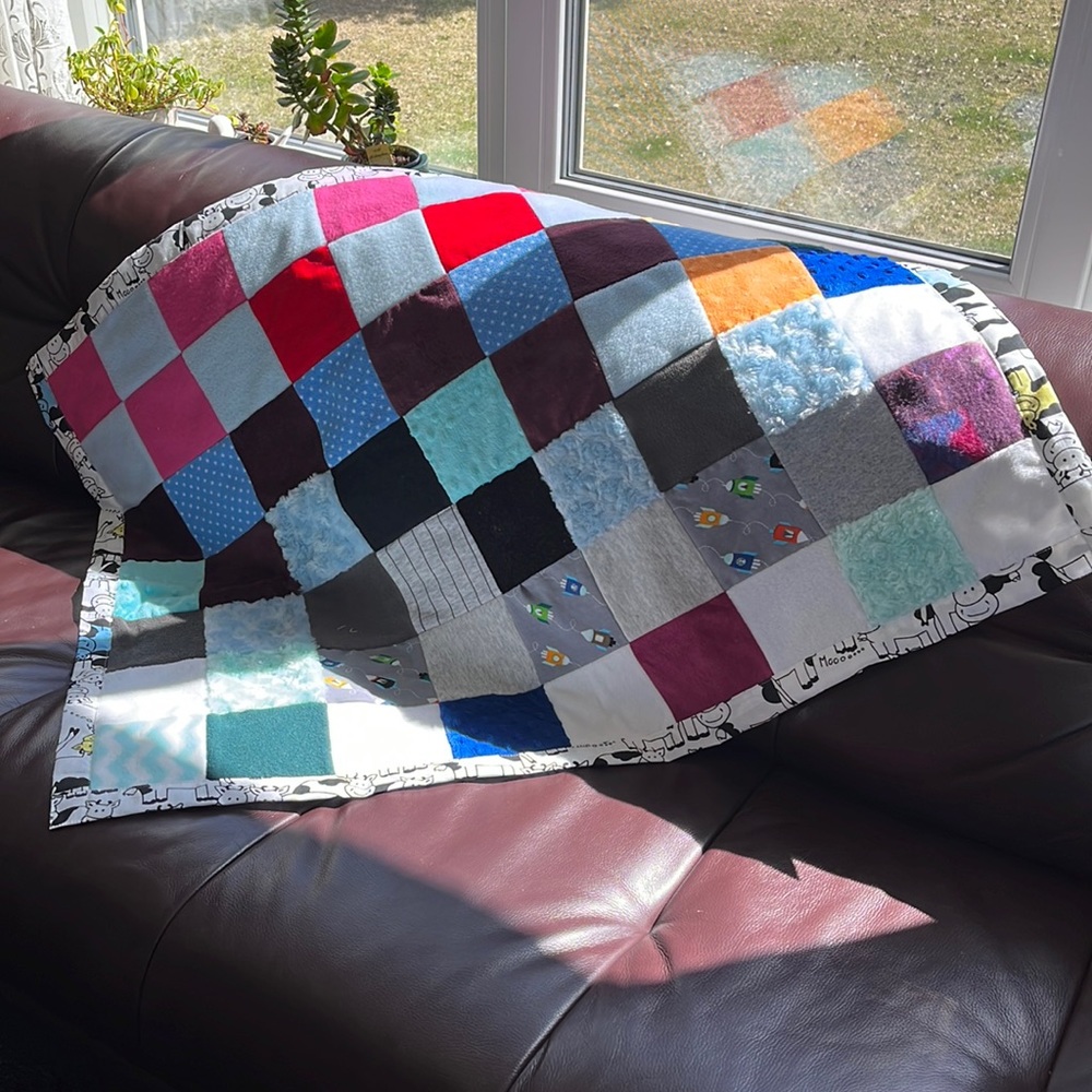 unbranded flannel and minky quilt with cow backing